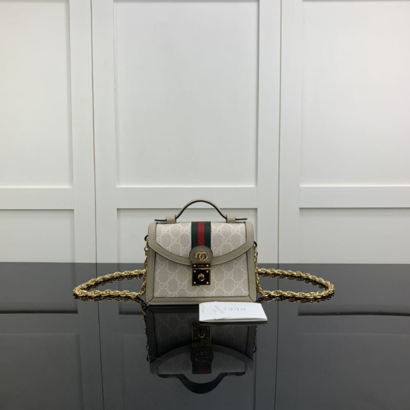 G*u*i top handle bags